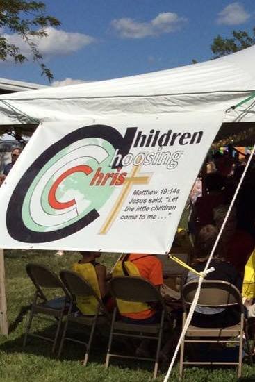 children choosing christ tent